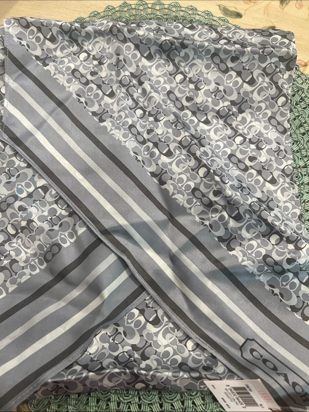 NWT 100% silk Coach Gray and White Signature Pattern scarf.